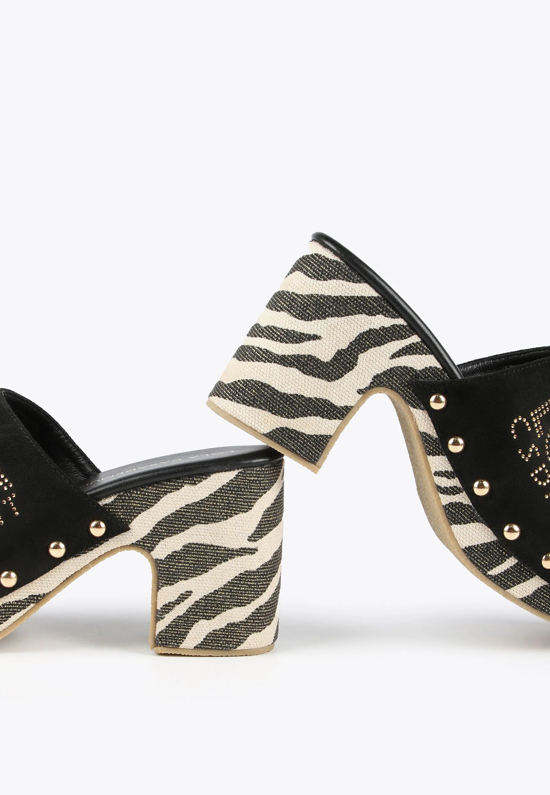 Clogs with animal print soles