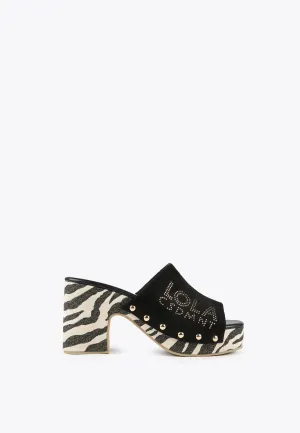 Clogs with animal print soles